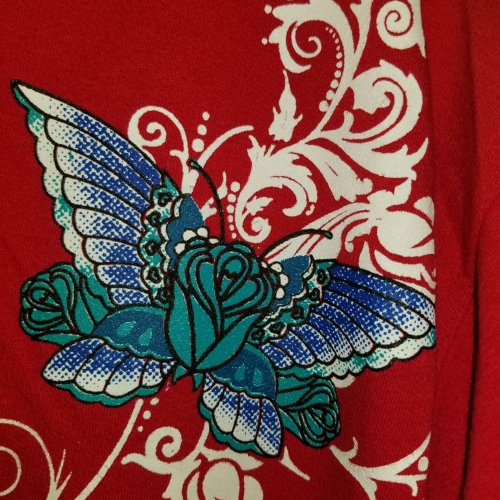 3x Red hoodied with a royal blue & white butterfly and teal rose.
